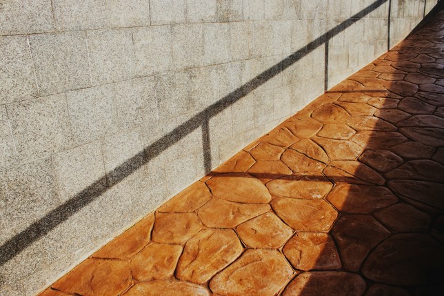 Colored stamped concrete walkway with steps in Old Bridge NJ